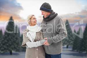 Romantic senior couple wearing sweaters during winter
