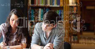 Male and female students solving equations together