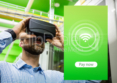 Man wearing VR Virtual Reality Headset with Pay Now Interface