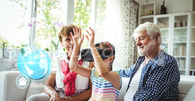 Child with grandparents wearing VR Virtual Reality Headset with Interface