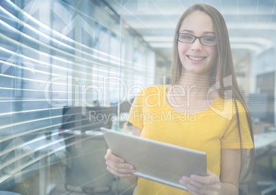 Woman in yellow in office with arrow graphic overlay