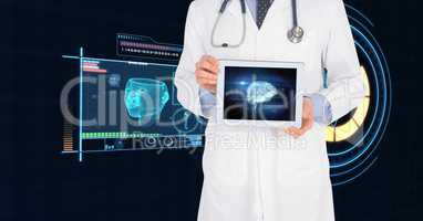 Midsection of doctor showing digital tablet with medical interface