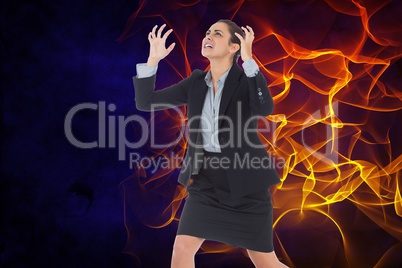 Digital composite image of angry businesswoman with fire