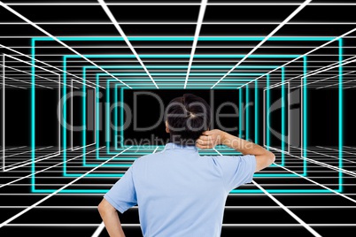Rear view of confused businessman looking at abstract patterns