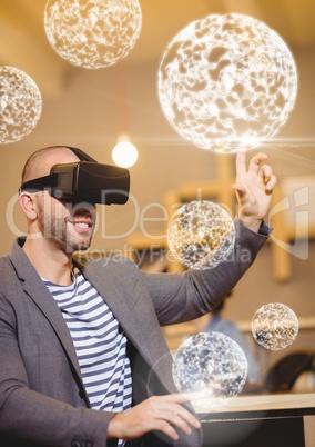 Man wearing VR Virtual Reality Headset with Interface Orbs