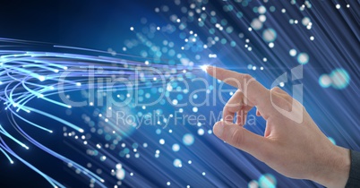 Digital composite image of hand touching lines on screen