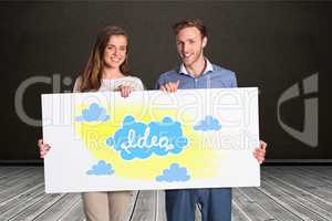 Happy couple holding billboard with idea and cloud signs