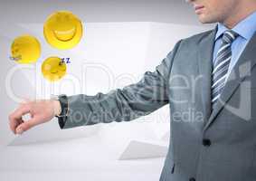 Business man with hand out and emojis with flares against white background