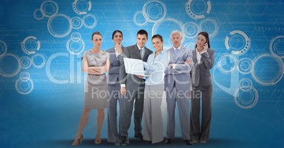 Digitally generated image of business people using laptop and smart phone against icons on blue back