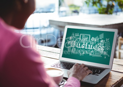 Woman at laptop showing white business doodles against teal background