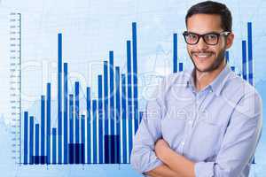 Confident businessman standing arms crossed against graph
