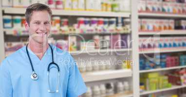 Portrait of happy male doctor at pharmacy