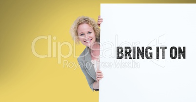 Portrait of businesswoman behind bill board with bring it on sign