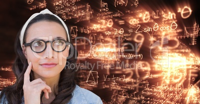 Thoughtful woman over math equation background