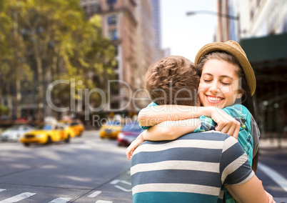 Couple hugging in the city