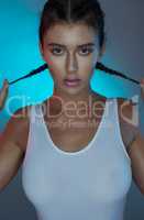 Portrait of pretty brunette girl with braids