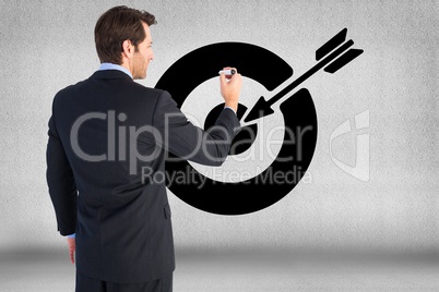 Rear view of businessman setting target