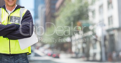 traffic controller with hands folded  and blurred background