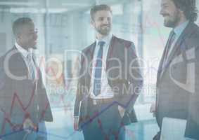 Three business men with chart graphic overlay