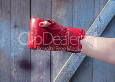 Right hand female in a red boxing glove