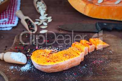 piece of ripe pumpkin in salt and pepper