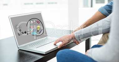 Digital composite image of business people using laptop with idea icons on screen