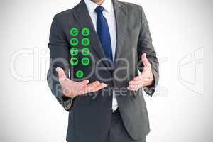 Digital composite image of businessman with medical icons