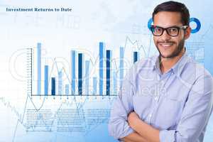 Digital composite image of businessman with arms crossed over graphs