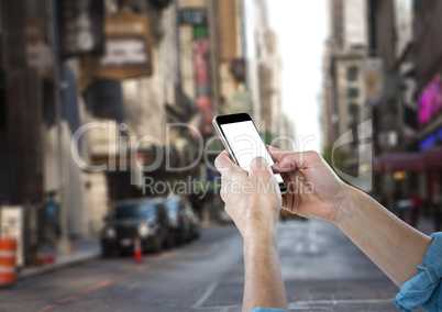 men hands with mobile in the city