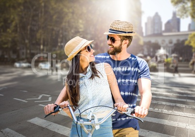 Couple with the bike in the city