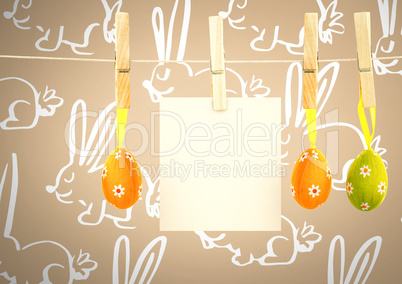 Easter Eggs on pegs with note in front of pattern