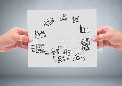 Hands holding card with business graphics drawings