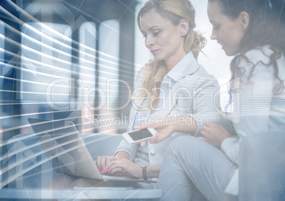 Business women with phone and laptop behind blue arrow graphic overlay