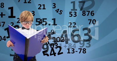 Digitally generated image of boy reading book with numbers flying against patterned background