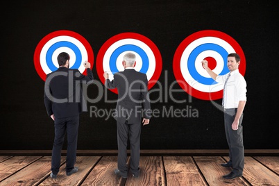 Digital composite image of business people setting targets