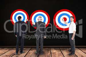 Digital composite image of business people setting targets