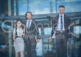 Business people walking with gear graphic overlay
