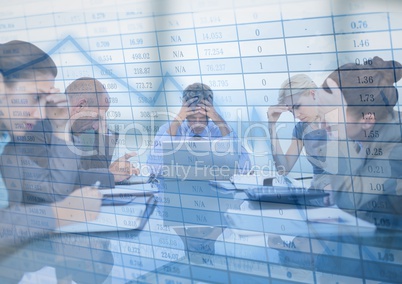 Stressfull business meeting with chart graphic overlay against blurry window