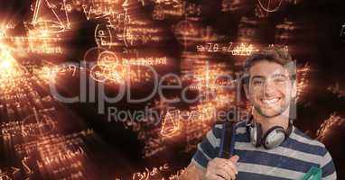Digital composite image of male student over math background