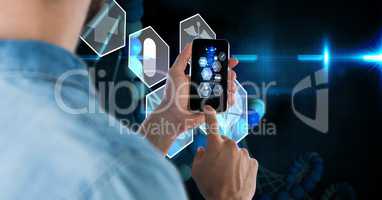 Digital composite image of businessman using smart phone with virtual screen in background
