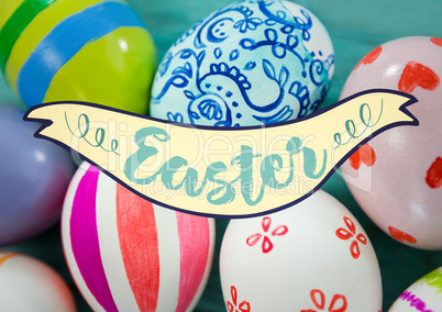 Easter banner against eggs on teal table