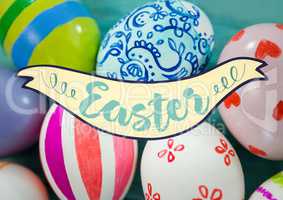 Easter banner against eggs on teal table