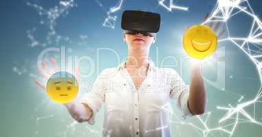 Woman in VR with network and emojis with flares against blue green background