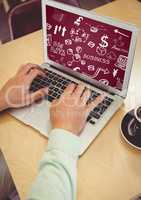 Hands with laptop showing white business doodles and maroon background