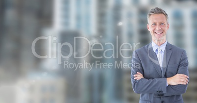 Happy CEO with city blurred background