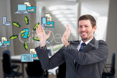 Digitally generated image of businessman gesturing with various icons while working in office