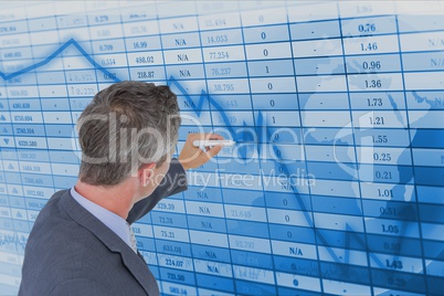 Businessman making graph on futuristic screen