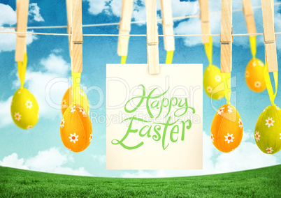 Happy Easter text with Easter Eggs with note on pegs in front of pattern