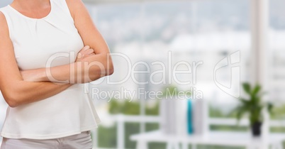 white shirt business woman with his hands folded with blurred background
