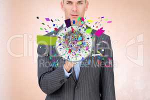 Businessman with confetti emerging from megaphone